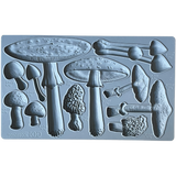 IOD Toadstool Mould with assorted mushroom shapes, each marked with milliliter measurements. Brand: I.O.D.