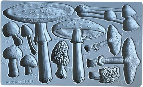 The Toadstool Mould by IOD showing assorted mushroom shapes in gray silicone by I.O.D.
