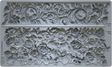 Two grey floral relief designs for I.O.D. Trimmings 4 Mould by Iron Orchid Designs Silicone Decor Mold.