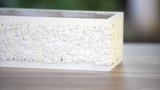 White box with floral carvings made from I.O.D. Trimmings 4 Mould on a wooden surface.