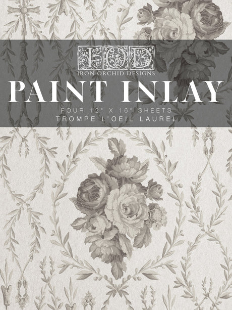 Trompe L’oeil Laurel Paint Inlay by I.O.D. with gray floral and leaf designs.