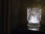 IOD Tulips Mould displayed against dark wood, showing its distinctive floral decorative design.