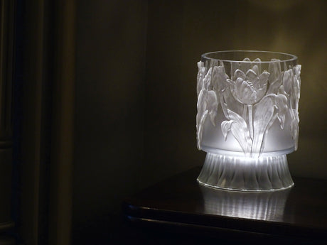 IOD Tulips Mould displayed against dark wood, showing its distinctive floral decorative design.