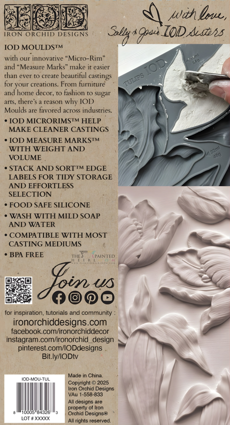 Hand pressing I.O.D. Tulips Mould against gray, white, and mauve swirled patterns.