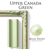 Green frame and molding displayed beside Upper Canada Green Milk Paint by Homestead House.