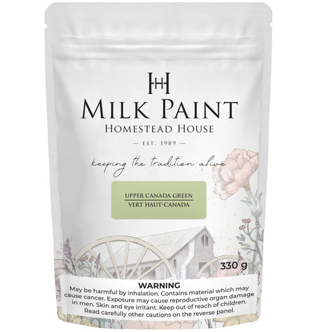 330g Homestead House Upper Canada Green Milk Paint bag with floral and wagon wheel graphics on the front.