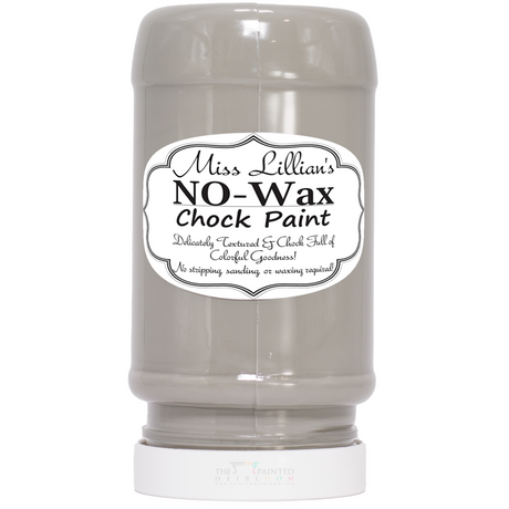 Miss Lillian’s Uptown Castle No-Wax Chock Paint gray can displayed upside down.