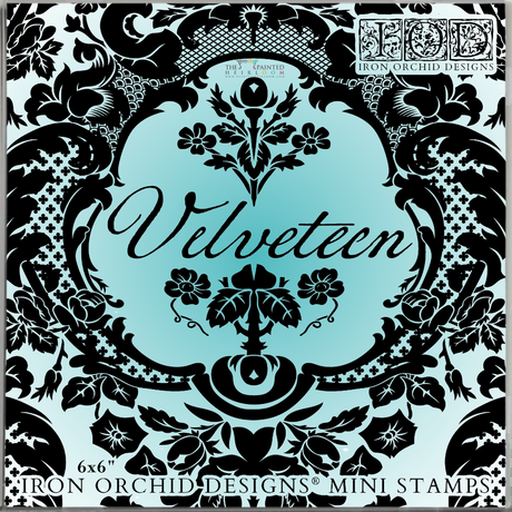 Black floral frame on blue with “Velveteen” text, made using I.O.D. Velveteen Mini-Stamp and damask accents.