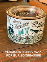 DIY Paint Co. Verdigris Shipwrecked DIY Wax can with teal label on wood surface.