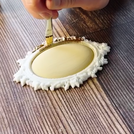 Brush applies gold edge to ornate frame, inspired by I.O.D. Vintage Brooches Mould from Iron Orchid Designs.