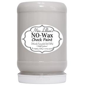 Miss Lillian’s Vintage Storm No-Wax Chock Paint in a white container with a black and white decorative label.
