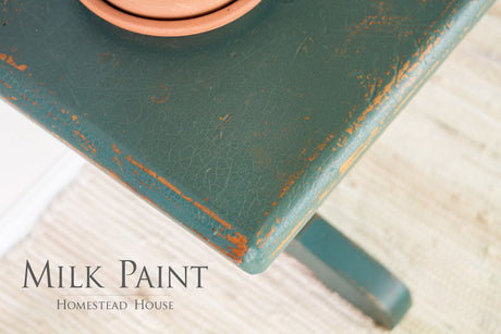 Green table in Waterloo Green Milk Paint by Homestead House; “Homestead House” text visible.