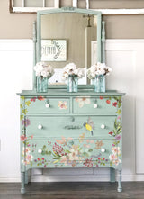 Mint dresser with I.O.D. Whispering Willow floral transfer, mirror, and white flowers.
