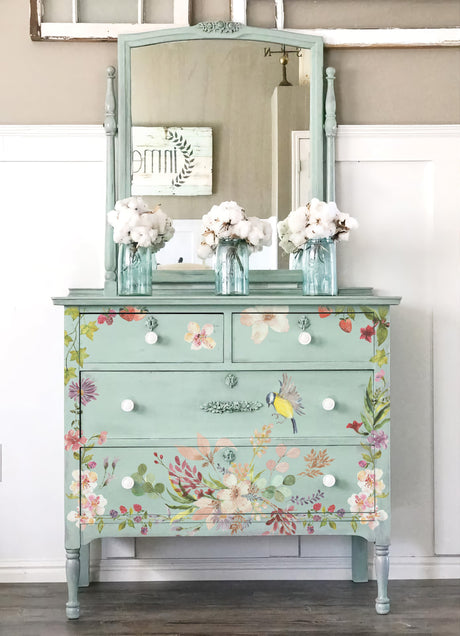 Mint dresser with I.O.D. Whispering Willow floral transfer, mirror, and white flowers.