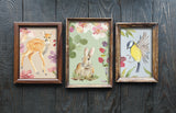 Set of three framed prints: fawn, rabbit with florals, and yellow bird art using I.O.D. Whispering Willow Transfer.