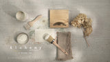 Fusion Mineral Paint White Oak Alchemy Paint, paintbrushes, and wooden box with dried flowers on textured surface.