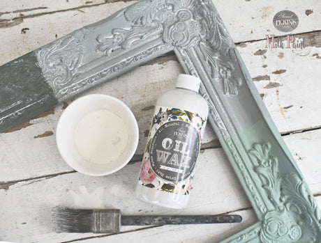 White Oil Wax by Sweet Pickins with brush, shown on rustic table; brand: Old Fashioned Milk Paint.