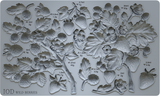 IOD Wild Berries Mould showing strawberry, raspberry, and leaf cluster shapes with volume and weight labels.