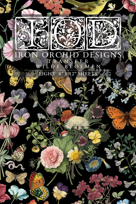 Vivid flowers and insects on black with “Wilde Bloemen Transfer by IOD - Iron Orchid Designs” overlaid.