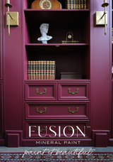 Burgundy bookshelves with gold hardware painted in Winchester Fusion Mineral Paint by Fusion Mineral Paint.