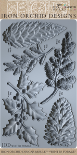 Winter Forage Mould (2025) by I.O.D. with pinecone, holly, and branch motifs.