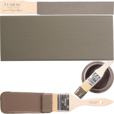 Fusion Mineral Paint brush, painted board, and open Wood Wick Fusion Mineral Paint can with brush inside.