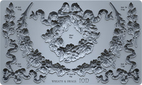 I.O.D. Wreath & Swags Mould in food-safe silicone, floral design with section volume and weight labels.