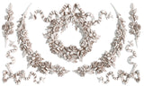 Symmetric floral and ribbon patterns formed with I.O.D. Wreath & Swags Mould for vintage-style decoration.