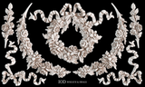Wreath, swags, and ribbons created with I.O.D. Wreath & Swags Mould by Iron Orchid Designs on a black background.