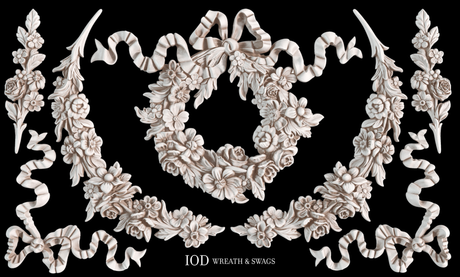 Wreath, swags, and ribbons created with I.O.D. Wreath & Swags Mould by Iron Orchid Designs on a black background.