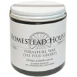 Homestead House Fusion Mineral Paint Antiquing Furniture Wax jar with black text and wagon wheel graphic on label.