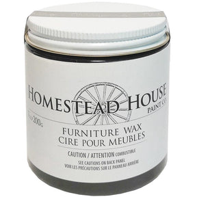 Homestead House Fusion Mineral Paint Antiquing Furniture Wax jar with black text and wagon wheel graphic on label.