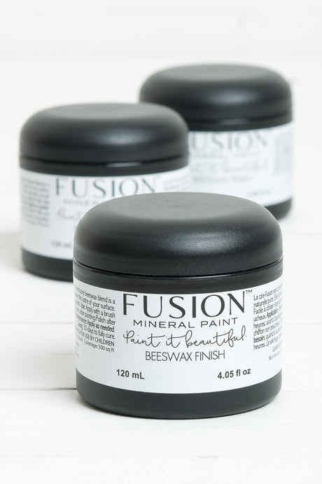 Three 120 mL jars of Fusion Mineral Paint Beeswax Hemp Finish, a natural, food-safe wood finish.