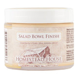 Beeswax Salad Bowl Finish by Fusion Mineral Paint in a small jar on a plain background.