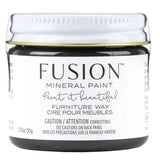 Fusion Mineral Paint Black Furniture Wax jar with English and French labels.