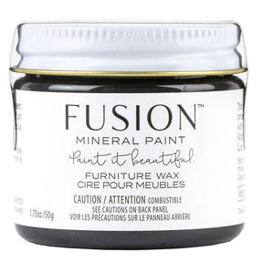 Fusion Mineral Paint Black Furniture Wax jar with English and French labels.