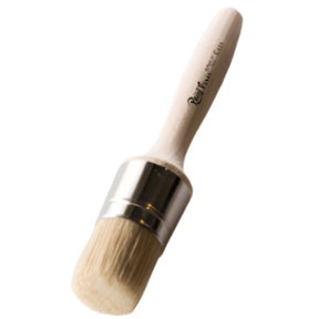 Paint Pixie Cera Wax Brush with round light wood handle and white bristles for painting and waxing projects.