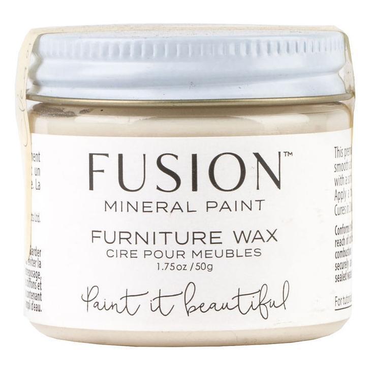 Fusion Mineral Paint Clear Furniture Wax, 1.75 oz jar with white label and silver lid.