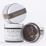 Three jars of Fusion Mineral Paint Espresso Furniture Wax, one open to reveal the dark brown wax inside.