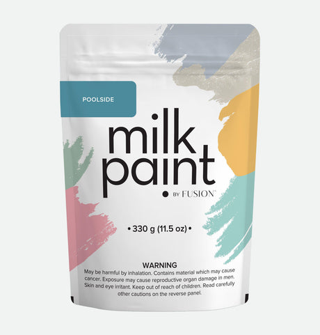 Poolside Milk Paint by Fusion Mineral Paint, 330g pouch with colorful brushstrokes and exposure warning label.