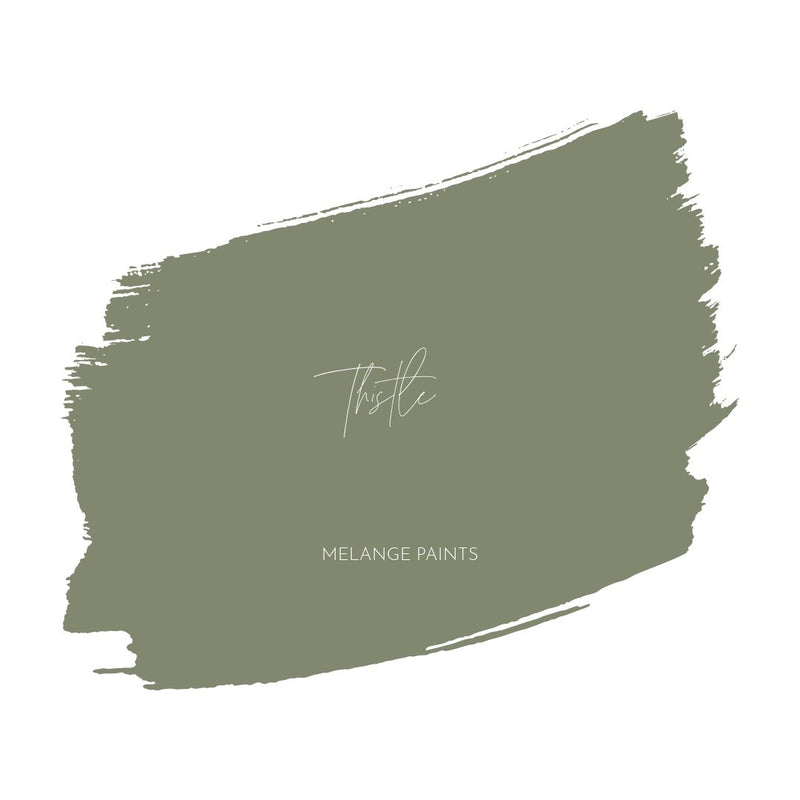 Greenish-gray Thistle paint swatch with “Thistle” and “MELANGE PAINTS” in white text at the center.