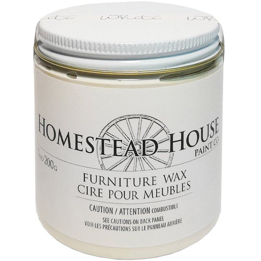 Fusion Mineral Paint White Furniture Wax by Homestead House in a clear jar with metal lid and bilingual label.